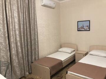 Классический четырехместный номер в Гостинице Pamir Hotel